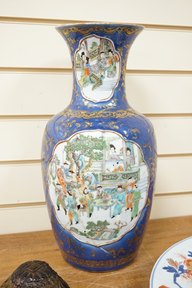 Three early 18th century Chinese Imari dishes (one clobbered), largest 46.5cm, together with a 19th century Chinese powder blue ground vase, 44cm high and a horn carving, 13.7cm (5)